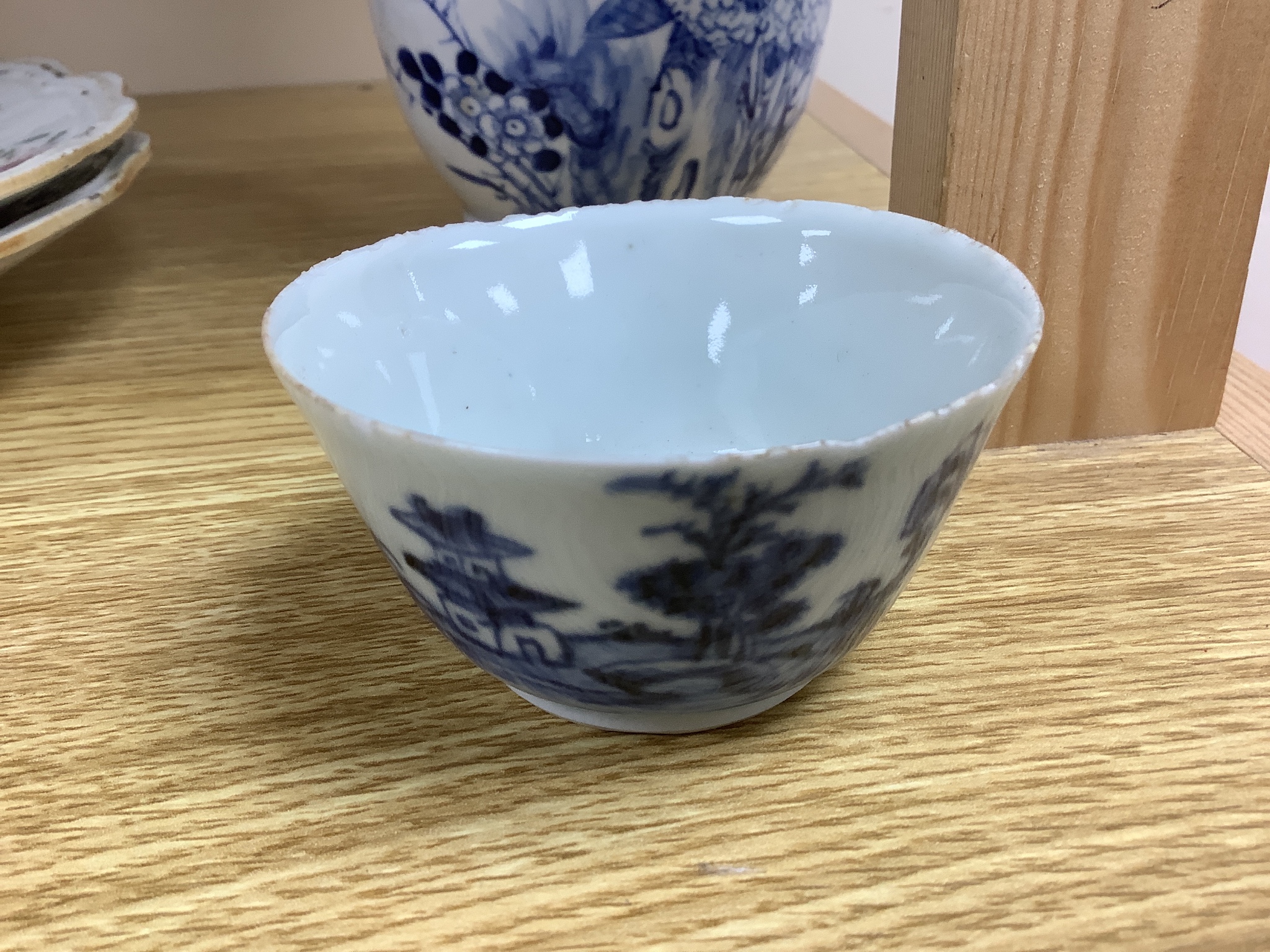 A Chinese late 19th century blue and white vase, height 25.5cm, a pair of 18th century Chinese export famille rose plates and a blue and white tea bowl